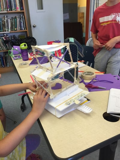 Students engineer earthquake-resistant structures at Mustard Seed School.