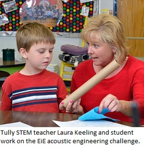 Tully STEM teacher Laura Keeling and student work on an audio engineering challenge.